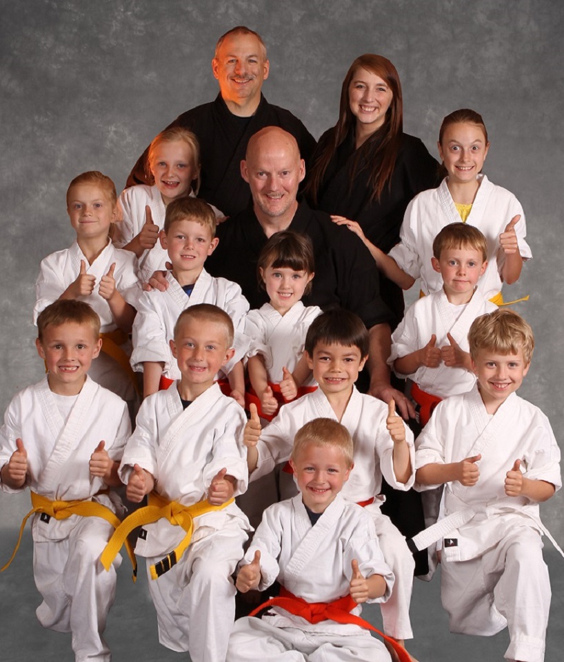 Mr. Christensen with karate kids and adults